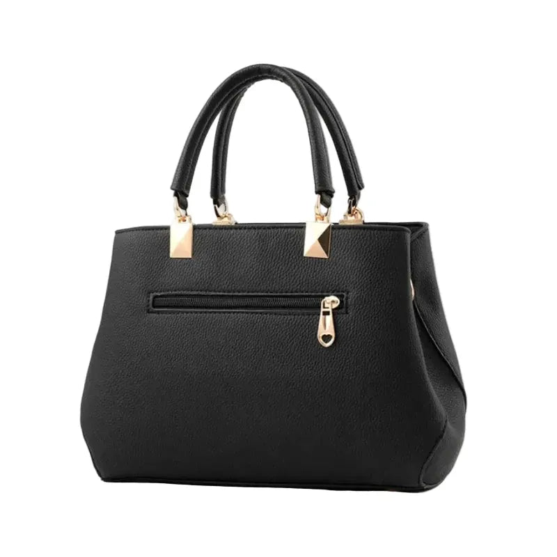Le Sac Trapèze Noir Grainé avec Bijou Nœud LUNAVIA PANTS