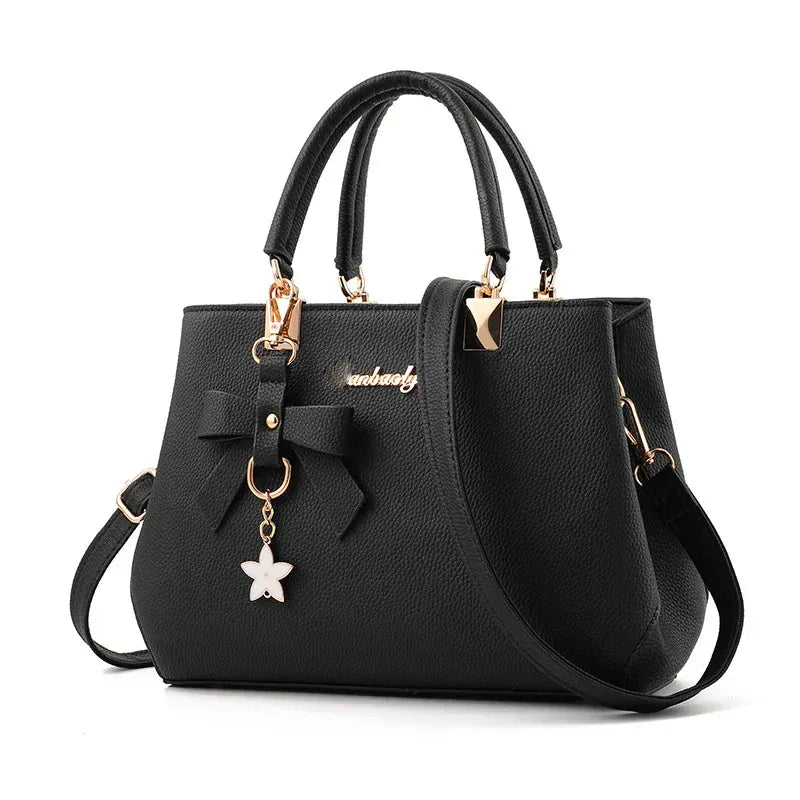 Le Sac Trapèze Noir Grainé avec Bijou Nœud LUNAVIA PANTS