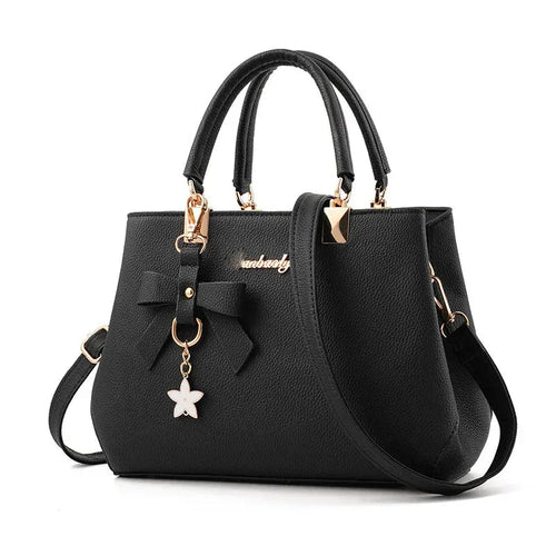 Le Sac Trapèze Noir Grainé avec Bijou Nœud LUNAVIA PANTS